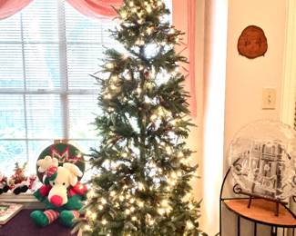 Skinny lighted Christmas tree