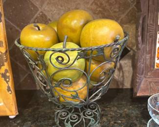Metal basket with apples
