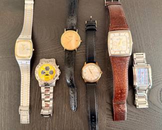 Men's watches including Movado, Peugeot, and Skagen