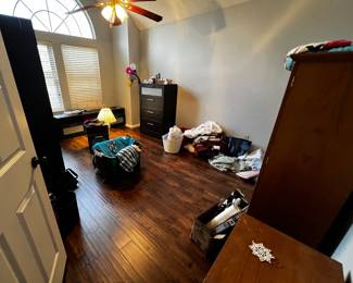 Bedroom furniture, dressers, nightstands, floor lamps, clothes, bedding