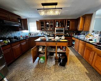 Tons of kitchen stuff - dishes, pans, air fryer, crystal glasses