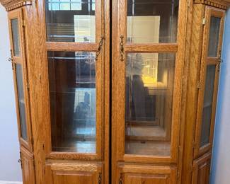 Large wood entertainment center with lights