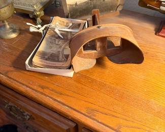 Antique wooden stereoscope viewer and photographs