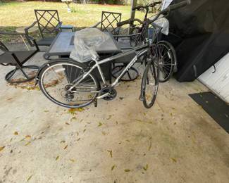 Man and lady TREK bikes