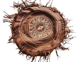 African leather pouf or hassock