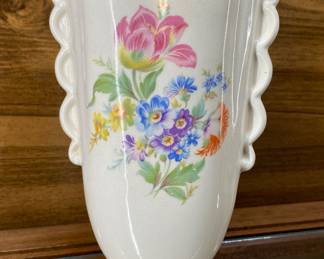  a white ceramic floral vase from a 1950's set