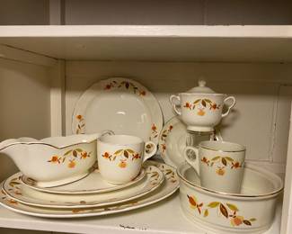 a collection of vintage Hall China Jewel Tea Autumn Leaf pattern dinnerware, manufactured between 1933 and 1976