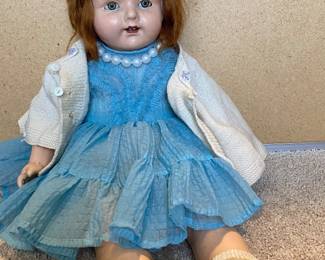 Antique composite doll with clothe body & blinking eyes & vintage clothes