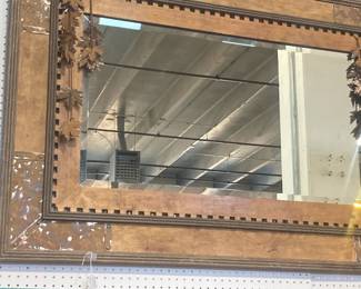 Wood framed mirror with decoration