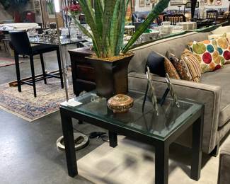 Wood end table with glass top, Artificial plant in metal pot