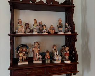 Hummel. Large carb Victorian Eastlake shelf with two drawers.