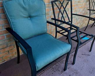 Outdoor chairs, all chairs have matching blue cushions