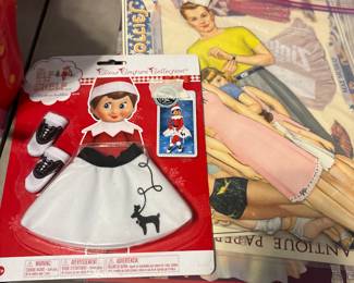 Downstairs -  Doll clothes and posters