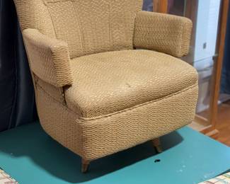 This is an MCM swivel rocker - it is on top of the corner table of the MCM Chair/sofa combo