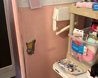 Items in room downstairs - Pink Refrigerator - checking on work status