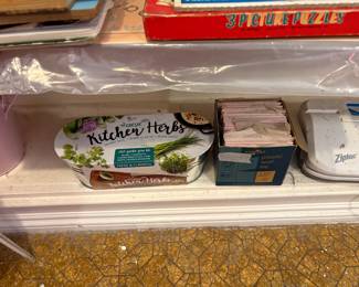 Dining Room - bottom shelf of bookcase