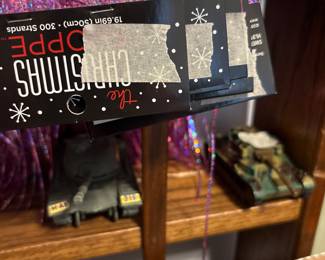 Downstairs - Plastic tanks on shelf - door for Christmas