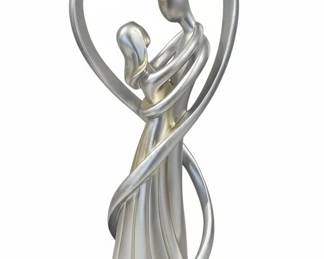 Couple Embracing Heart Sculpture