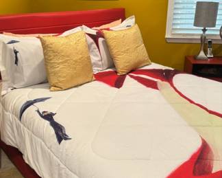 Red Faux Leather Upholstered Platform Bed Frame with Woman with Umbrella Themed Duvet Cover and Gold Pillows