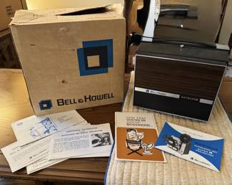 Vintage Bell and Howell Super 8 Movie Projector with Instruction Booklet
