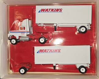 Collectible 1 64 Scale Diecast Metal Collectible Truck Set Featuring Watkins Motor Lines Trailers