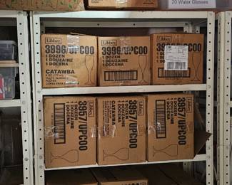 Caterer's delight - new in box wine and water goblets, matching hurricane lamp centerpieces