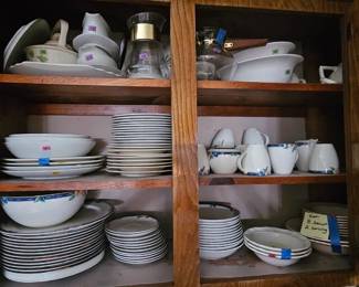 Multiple sets of plates and china