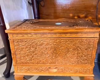 Antique carved wooden storage chest