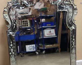 LRG. VENETIAN STYLE WALL MIRROR ORANATE SCALLOPED CRESTS WITH INTRICATE ETCHED FLORAL MOTIFS. 28X45 INCHES. NO SHIPPING PICKUP ONLY.