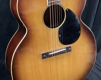 1940s KAY SILVERTONE K55 6 STRING ACOUSTIC GUITAR IN GOOD PLAYING CONDITION, NO STRESS CRACKS, VERY LIGHT BLEMISHES ON BODY, NECK IN GOOD CONDITION