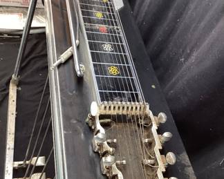 VTG. EMMONS PUSH-PULL SD10 PEDAL STEEL SLIDE GUITAR, 6 PEDAL & 3 KNEE LEVERS, SOLID HARD MAPLE BODY w GLOSS LAMINATE FINISH. THIS GUITAR WAS PROCURED FROM THE BUCK OWENS ESTATE IN CALIFORNIA. IT WAS PLAYED BY JAY MCDONALD OF THE FAMOUS BUCK OWENS BUCKAROOS BAND, BAKERSFIELD, CA. THE PEDAL STEEL GUITAR WILL NEED A TUNE UP. EMMONS LABEL HAS BEEN REPLACED WITH A HARLEY DAVIDSON BADGE. COMES WITH 2 CHROME TONE BARS AKA SLIDES & PICKS