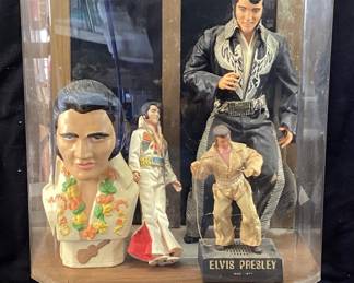 ASSORTED ELVIS PRESLEY DOLLS & COLLECTIBLES IN DISPLAY CASE CHALK WARE BUST, 1984 WORLD DOLL CELEBRITY COLLECTION PHOENIX DOLL, SOLID STATE 1970s COMMEMORATIVE AM RADIO FIGURE, 1984 EUGENE DOLL NO SHIPPING PICKUP ONLY