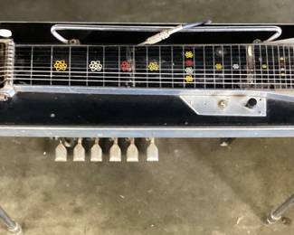 VTG. EMMONS PUSH-PULL SD10 PEDAL STEEL SLIDE GUITAR, 6 PEDAL & 3 KNEE LEVERS, SOLID HARD MAPLE BODY w GLOSS LAMINATE FINISH. THIS GUITAR WAS PROCURED FROM THE BUCK OWENS ESTATE IN CALIFORNIA. IT WAS PLAYED BY JAY MCDONALD OF THE FAMOUS BUCK OWENS BUCKAROOS BAND, BAKERSFIELD, CA. THE PEDAL STEEL GUITAR WILL NEED A TUNE UP. EMMONS LABEL HAS BEEN REPLACED WITH A HARLEY DAVIDSON BADGE. COMES WITH 2 CHROME TONE BARS AKA SLIDES & PICKS