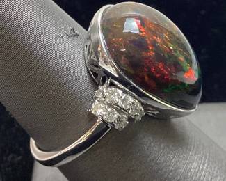 PLATINUM BLACK OPAL & DIAMOND RING, SIZE 7 10.75ct OPAL, 0.52cts DIAMONDS, 10.7g TOTAL WEIGHT, GGA APPRAISAL $10,860.00