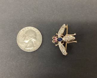  ANTIQUE VICTORIAN BEE BROOCH CRAFTED BETWEEN 1870-1910. THIS VICTORIAN BEE BROOCH FEATURES A BEAUTIFUL SAPPHIRE THORAX, RUBY CABOCHON EYES AND 14 ROSE CUT DIAMONDS INSET ON TO THE BODY AND WINGS. THESE ANTIQUE STONES ARE SET IN 18K GOLD AND SILVER. THE TOTAL WEIGHT IS 5.8 GRAMS. THIS EXQUISITE PIECE SHOWS THE CRAFTSMANSHIP FROM OVER A CENTURY AGO.