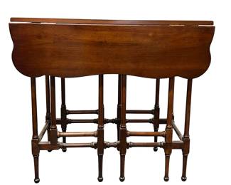 The Brandt cherry drop leaf diminutive table