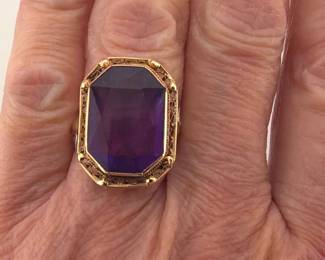Size 7 eight sided amethyst (approx. 16.5mm x 12.5mm) and 14kt gold dinner ring; 5.46g.