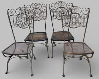 4 Vintage wrought iron patio side chairs with ornate scrollwork backs