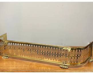 Brass paw foot fire fender