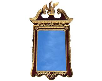 Mahogany and gilt Federal style mirror with Phoenix carved pediment
