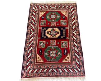 Armenian geometric scatter rug; 65” x 42.5”
