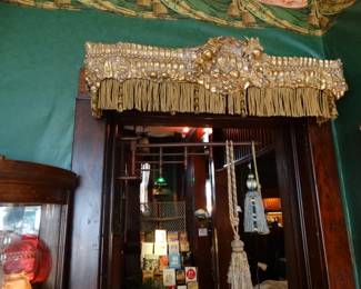 This is just 1 in a set of 4 (2 lg & 2 small in Repousse gilt metal w/ Boule Fringe