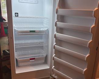 Frigidaire upright freezer - this house has two!