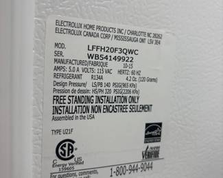 Frigidaire upright freezer - this house has two!