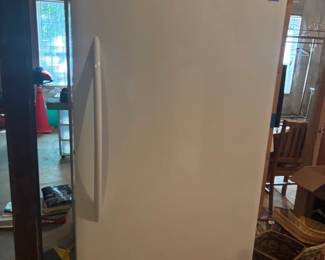 Frigidaire upright freezer - this house has two!