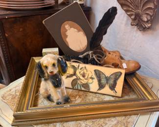 dog figurine, vintage photos, shell shelf