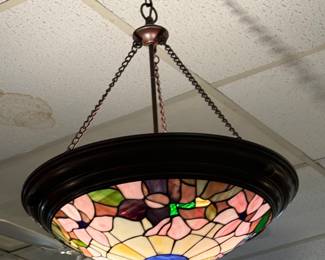 We have many beautiful and unusual vintage light fixtures