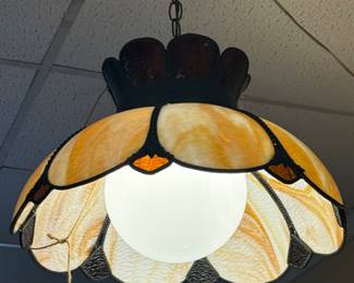 We have many beautiful and unusual vintage light fixtures