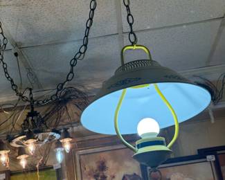 We have many beautiful and unusual vintage light fixtures