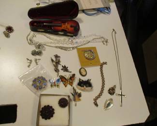 jewelry / violin is all there 